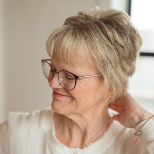 woman with short hair smiling