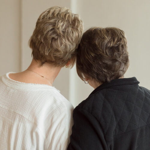 women turned around with short hair